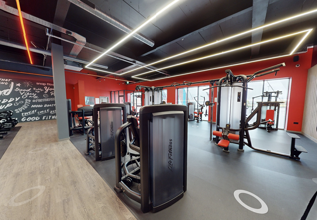 Fareham Snap Fitness ground floor looking towards the front door with the floor complete and machines in place