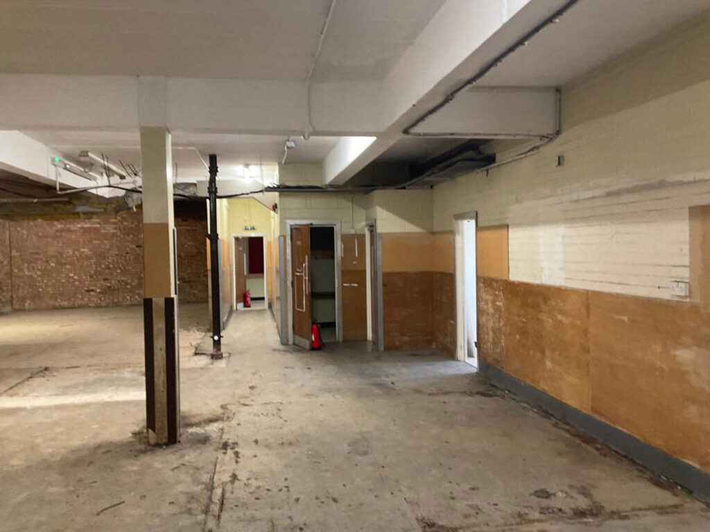 Addlestone ground floor showing small offices and walls to be demolished