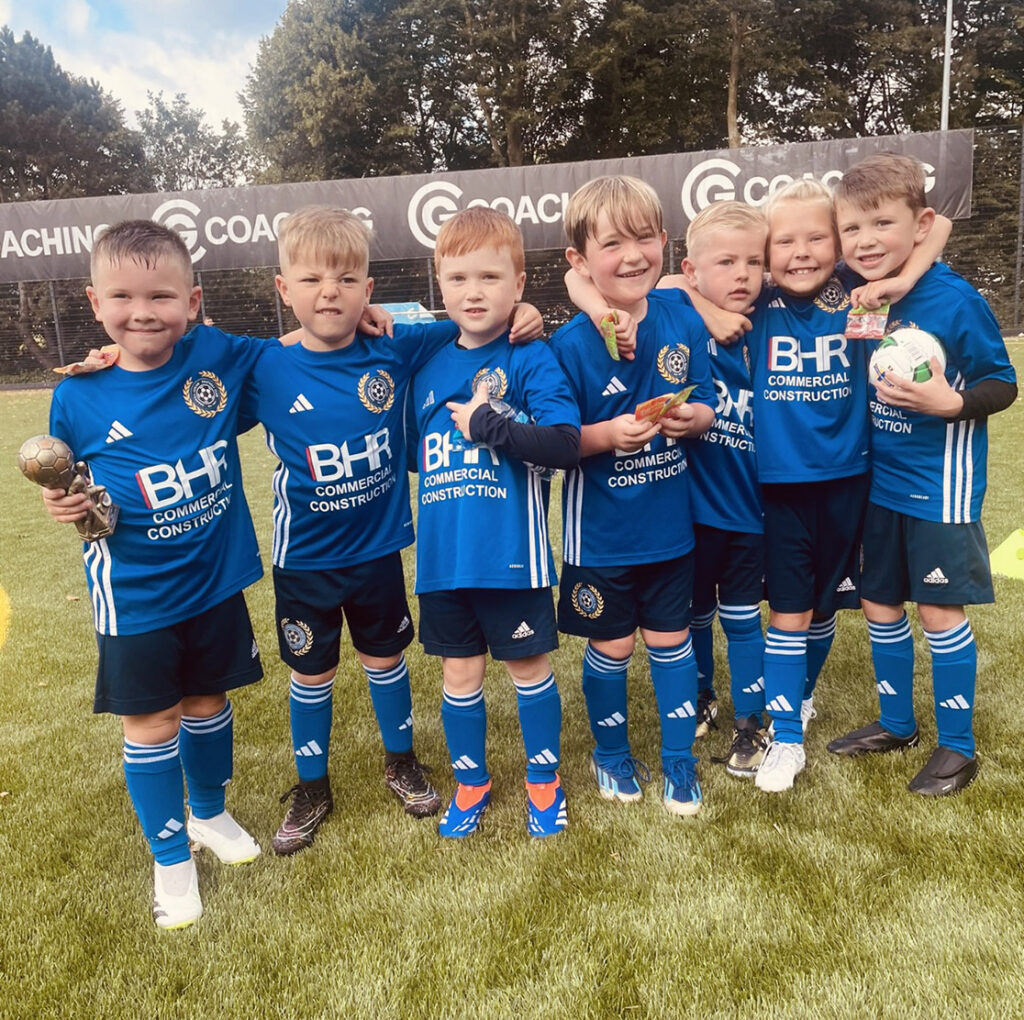 Renn's small-sided team celebrate a winn