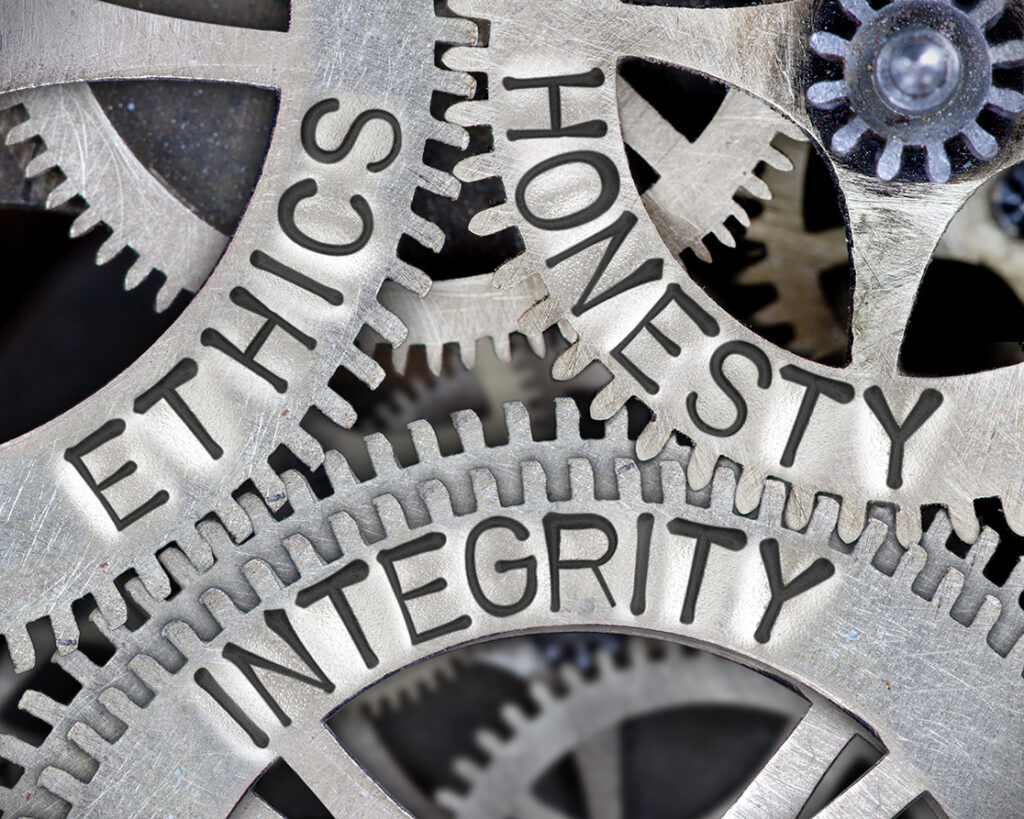 Honesty, integrity and ethics shown engraved on cogs, showing one of the reasons to partner with BHR